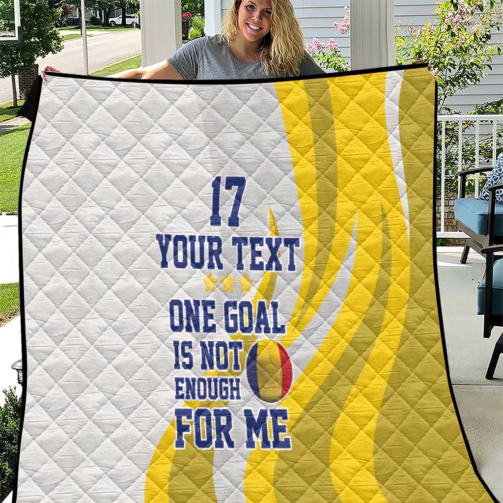 Yellow and white quilt with quilted diamond pattern and blue “YOUR TEXT / 17” text