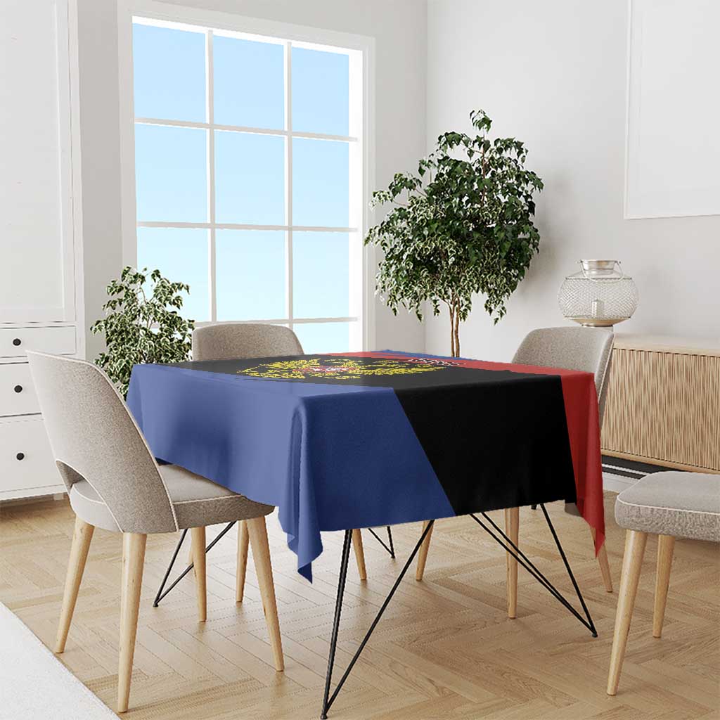 Russia coat of arms tablecloth draped over dining table, red blue and black stripes