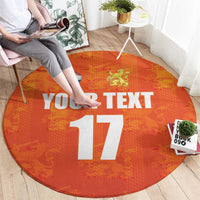 Orange round football rug featuring YOUR TEXT and number 17 with Netherlands flag icon