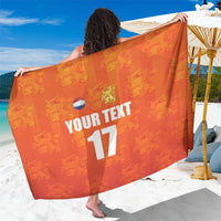 Orange custom sarong wrap with YOUR TEXT 17 graphic and Netherlands emblem