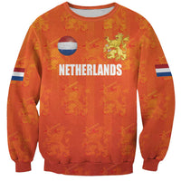 Orange Netherlands football sweatshirt with crew neck, long sleeves, front team graphic