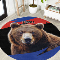 Round rug corner view with brown bear face and RUSSIA text in red black and blue