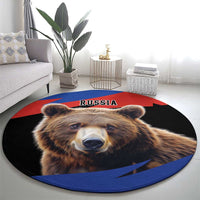 Round rug with brown bear face and RUSSIA text, red black and blue circular layout