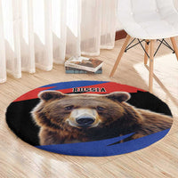 Round rug with brown bear face and RUSSIA text, red black and blue curved border design