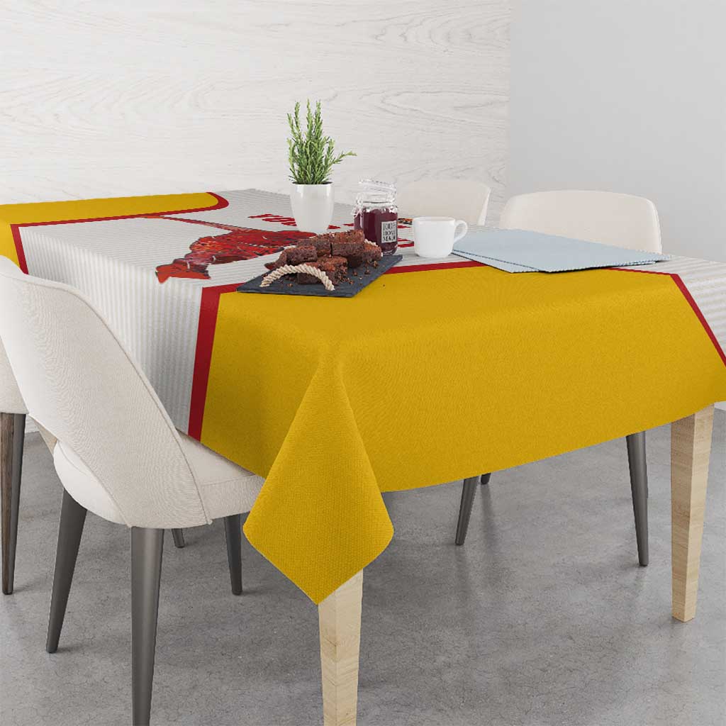 Yellow-over-white basketball tablecloth with red striped border and central player