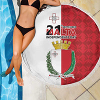 Round Malta Independence Day beach blanket with coat of arms, red/white print, fringed edge