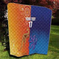 Orange and blue diamond-quilt blanket showing centered 'YOUR TEXT' and '17'