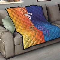 Orange and blue diamond-quilt blanket on sofa with centered 'YOUR TEXT' and '17'