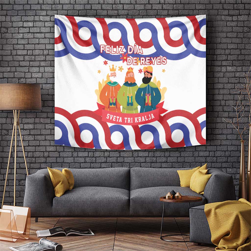 Tapestry with red and blue swirl border and Three Kings graphic on white background