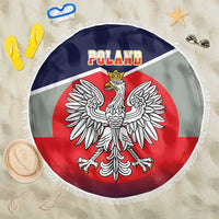 Round beach blanket with Poland text over navy and a crowned eagle crest in red, white fringe