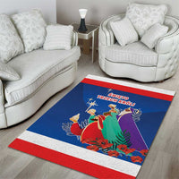 Blue decorative area rug with red and white border and Three Kings nativity artwork