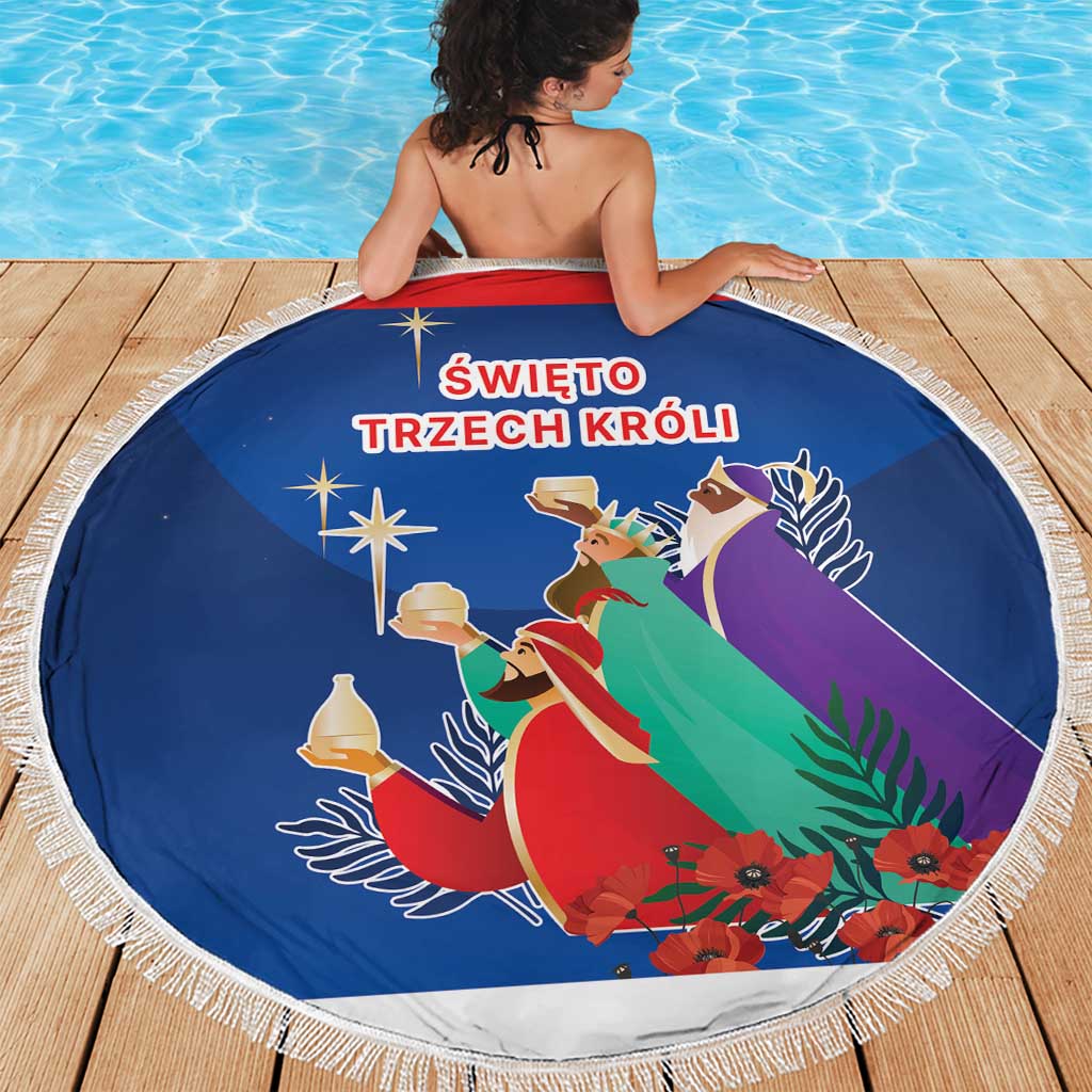 Blue round beach blanket featuring Three Kings nativity figures, white tassel fringe