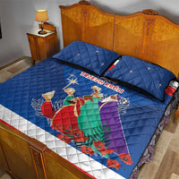 Blue quilt bed set with Three Kings figures, red and white edging, 2 matching pillows