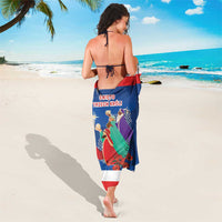 Blue Three Kings Day sarong with striped border and illustrated nativity figures