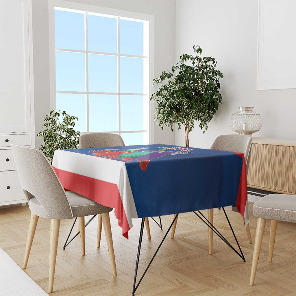 Blue and red Three Kings Day tablecloth on dining table with matching chairs