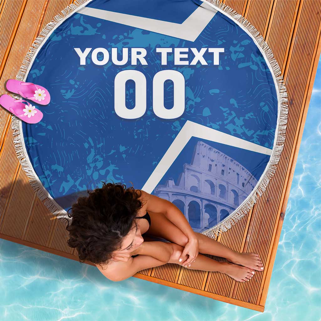 Round blue beach blanket with white fringe, 'YOUR TEXT' and '00' with Colosseum icon