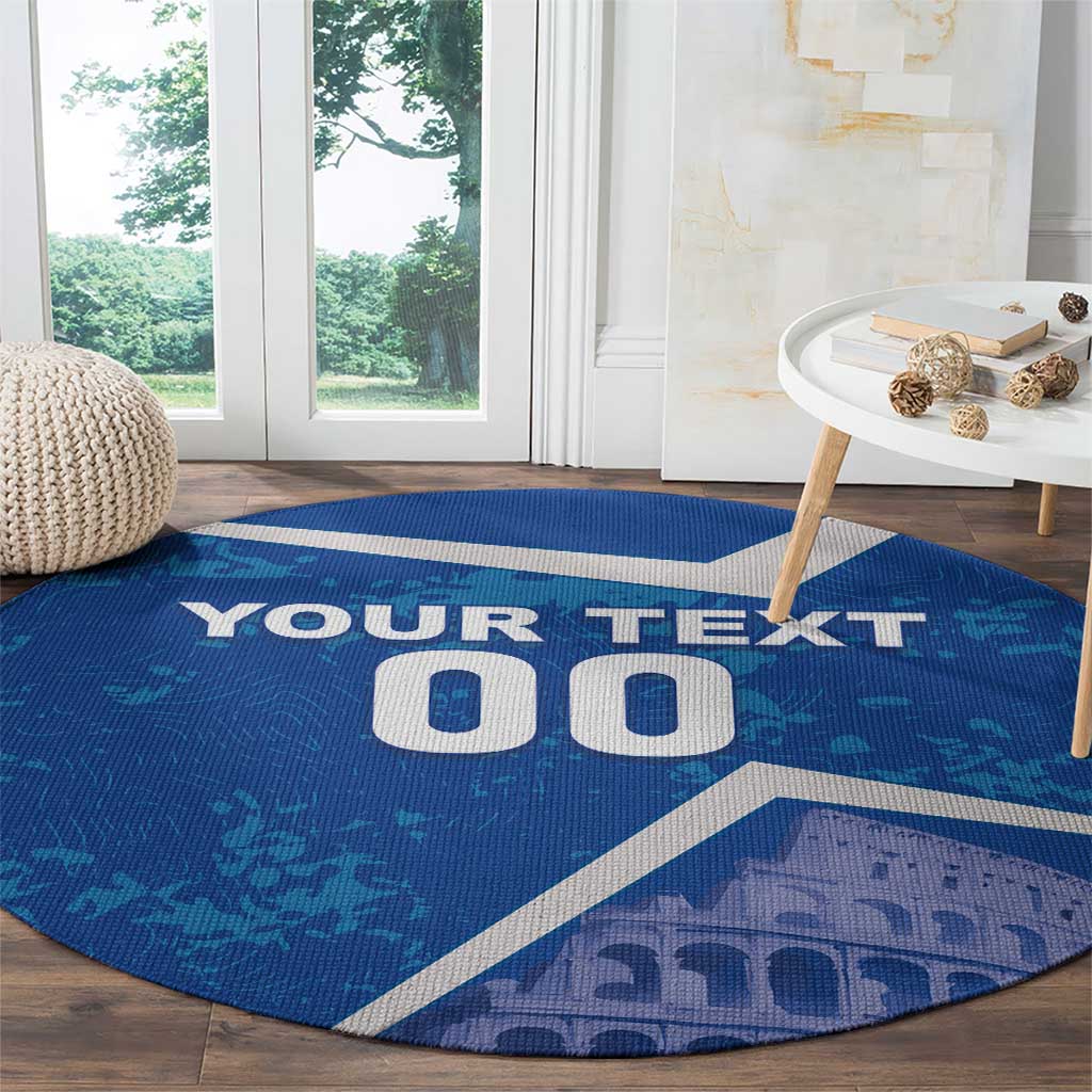 Blue round football carpet with white 'YOUR TEXT' and '00' over Colosseum design