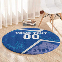 Blue round football carpet with white 'YOUR TEXT 00' and Colosseum print on floor