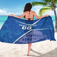 Blue sarong with white 'YOUR TEXT 00' and Colosseum graphic