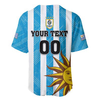 Blue and white striped Uruguay jersey with crest, sun artwork, and custom text