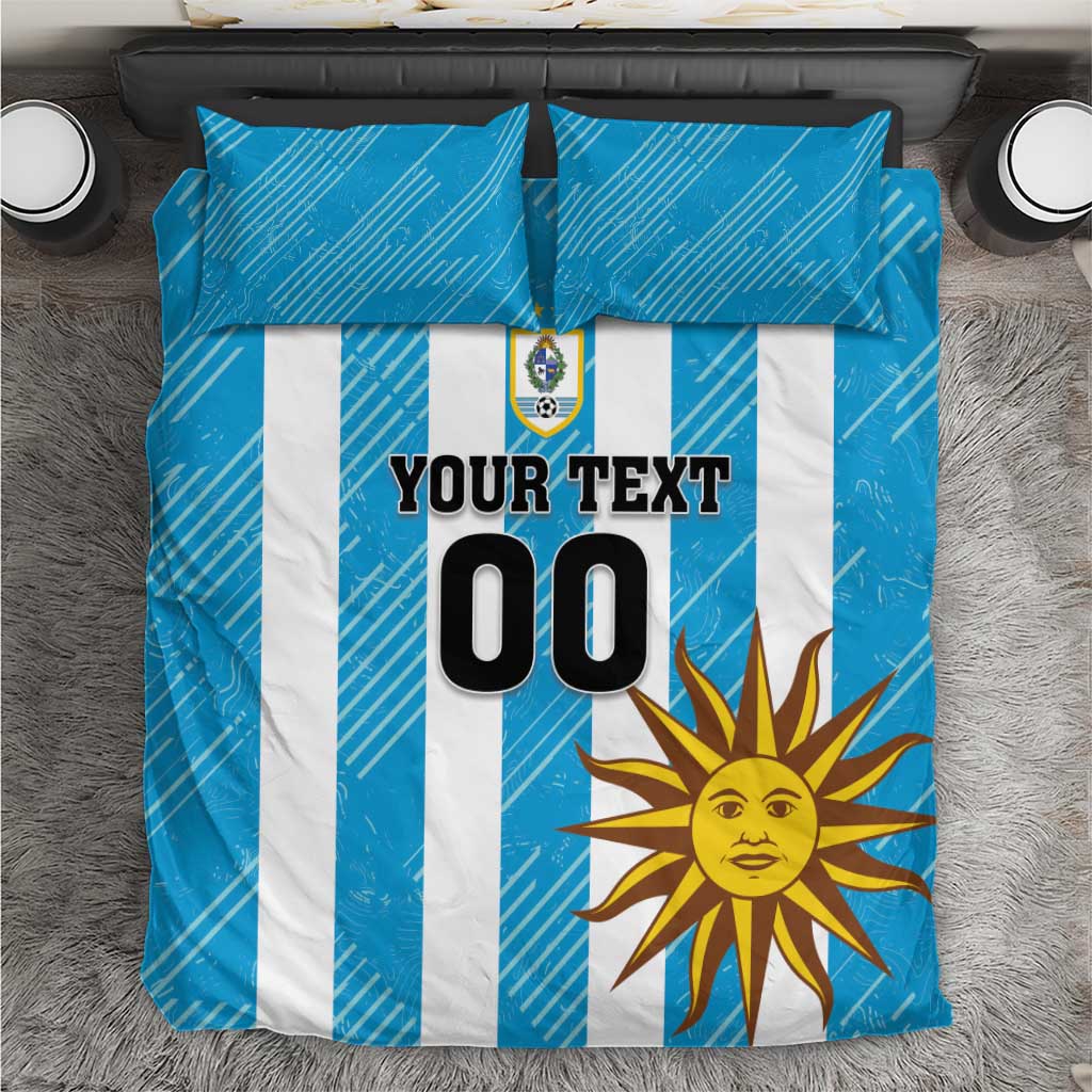 Blue duvet cover bedding set with white stripes, sun graphic, crest and "YOUR TEXT 00".