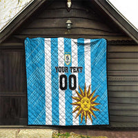 Blue football quilt with white stripe pattern, crest logo, sun graphic, and custom text