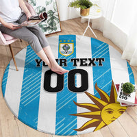 Round Uruguay carpet with blue background, white stripes, sun face and custom text