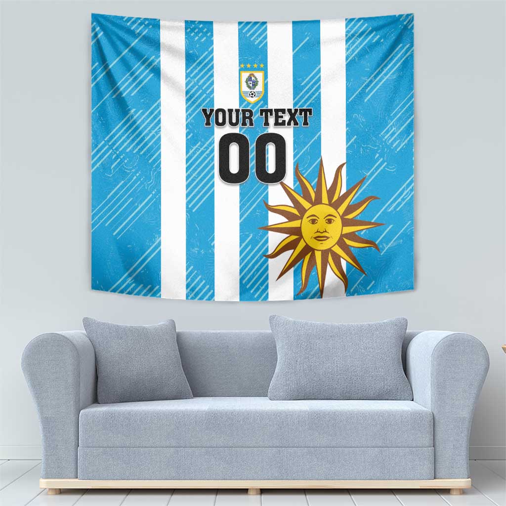 Blue wall tapestry with white vertical stripes, crest logo, sun graphic, and “YOUR TEXT 00”
