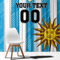 Blue and white football window curtain with large sun and bold graphic