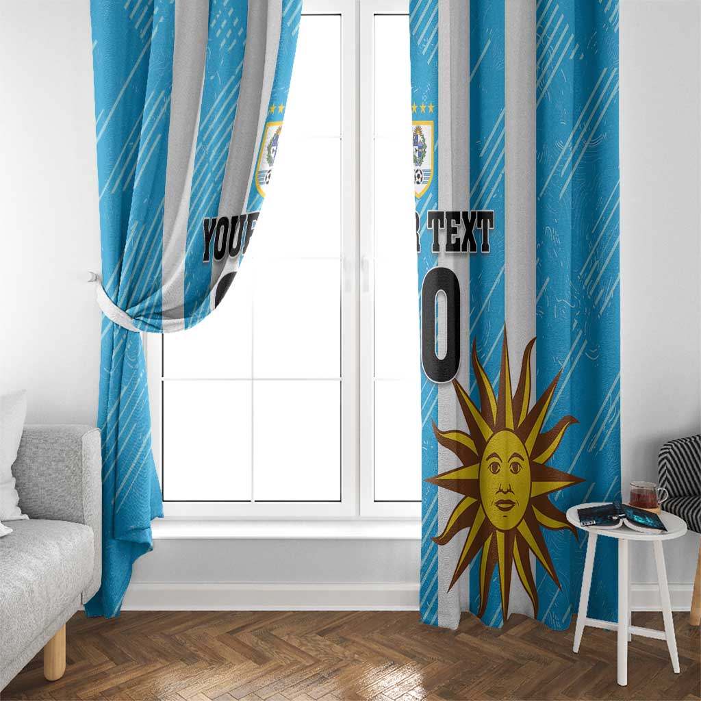 Blue Uruguay football window curtain with sun and team crest graphic, full-length panel.
