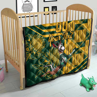 Custom South Africa rugby quilt on a crib mattress, yellow-and-green floral and animal print