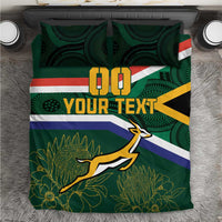 Close-up green rugby duvet cover with flag stripes, springbok mascot, and two pillowcases