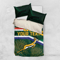 Green rugby bedding set with flag stripes, springbok graphic, and two matching pillowcases