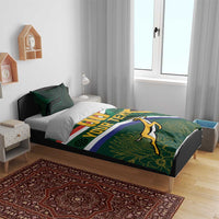 Green rugby duvet with flag stripes and springbok mascot, plus two patterned pillow shams