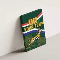 Green canvas wall art on wall with '00' and 'YOUR TEXT' plus antelope mascot