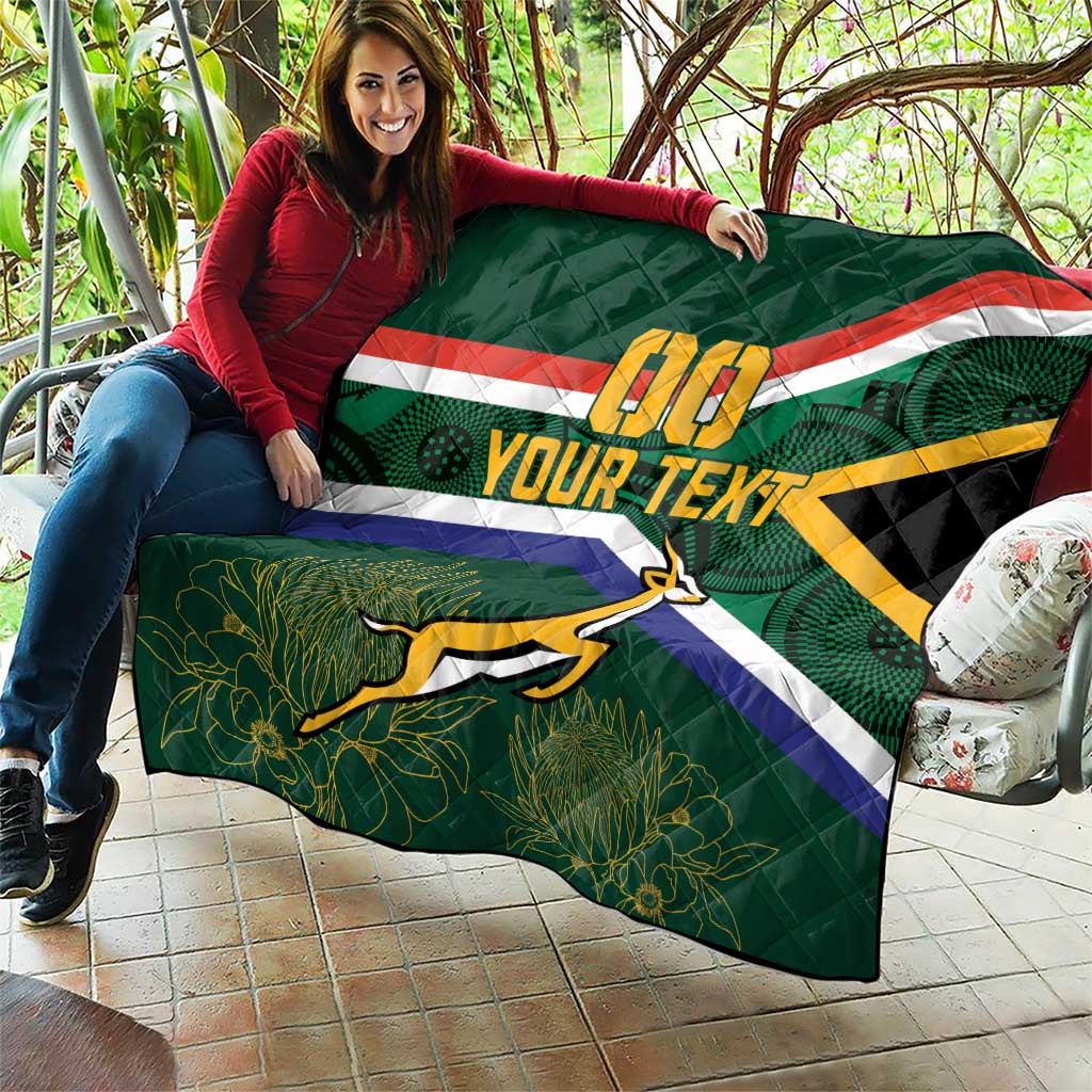 Green quilted blanket featuring Springbok mascot, South Africa flag stripes, and custom text