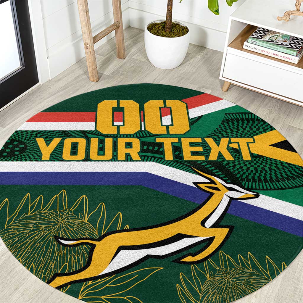 Round rugby theme rug close-up with green, blue, yellow stripes and mascot, custom text