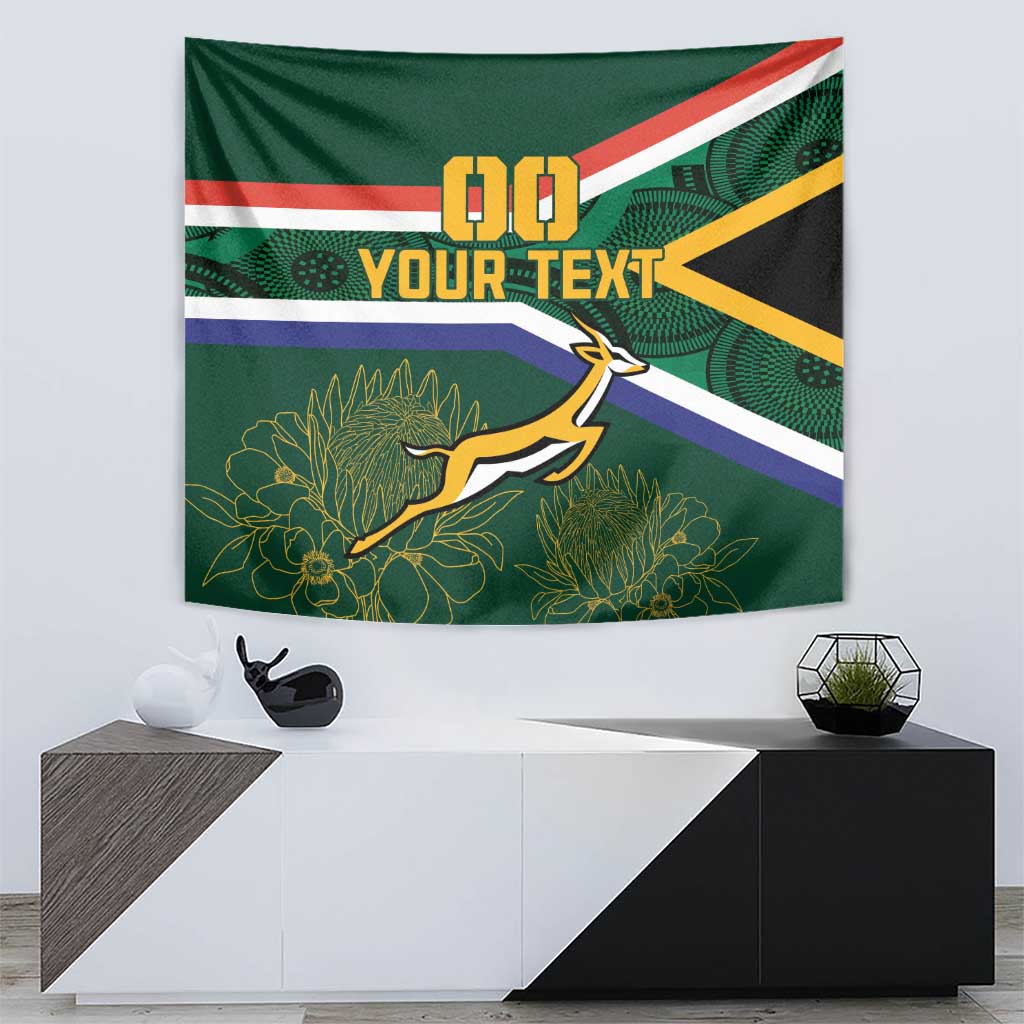 Green rugby wall tapestry with '00 YOUR TEXT', flag stripes, and antelope silhouette.