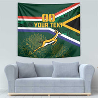 Green rugby wall tapestry with '00 YOUR TEXT', flag stripes, and antelope graphic.