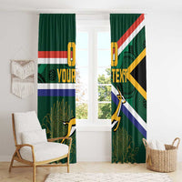 Green window curtains featuring South Africa flag stripes and springbok with 'YOUR TEXT'.