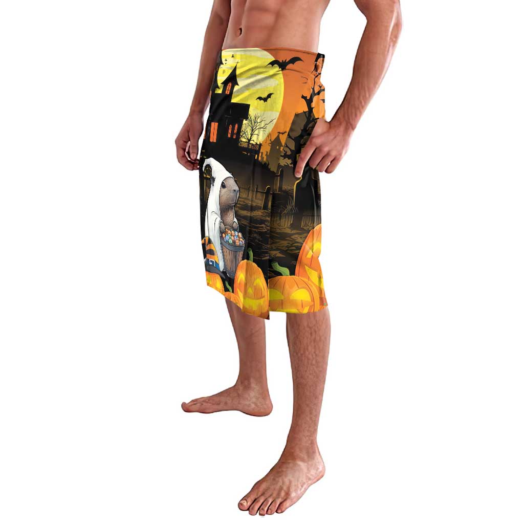 Halloween haunted house and jack-o'-lantern print swim shorts, orange trim