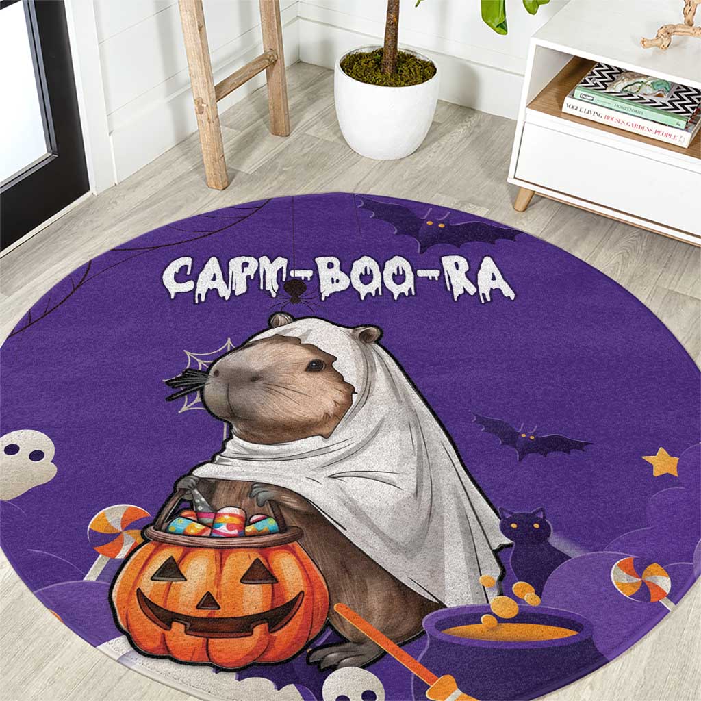 Purple Halloween round carpet with capybara in costume, pumpkins, bats, and ghosts