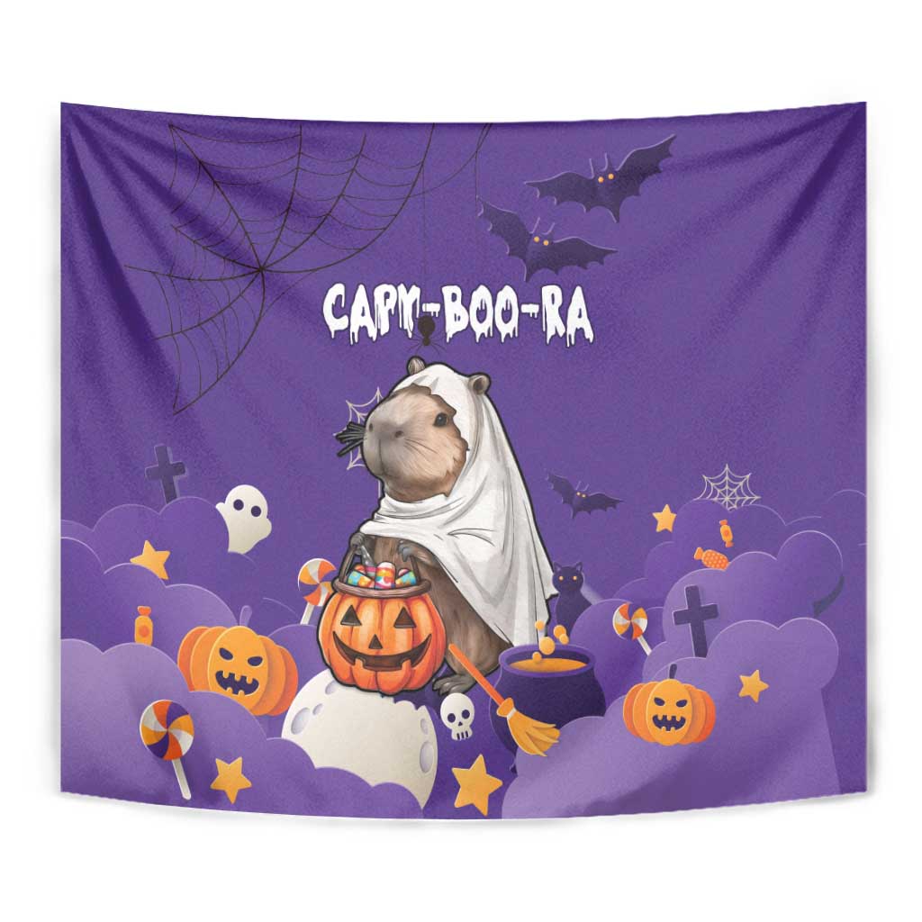 Close view of purple Halloween tapestry with capybara ghost, jack-o'-lantern, bats, and text