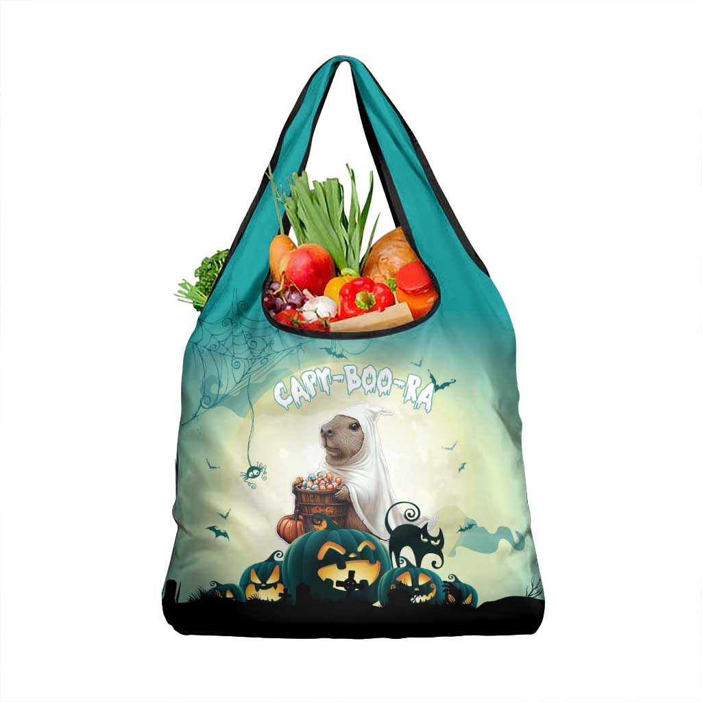 Green Halloween grocery tote bag with capybara pumpkin scene and 'CAPY-BOO-RA' text
