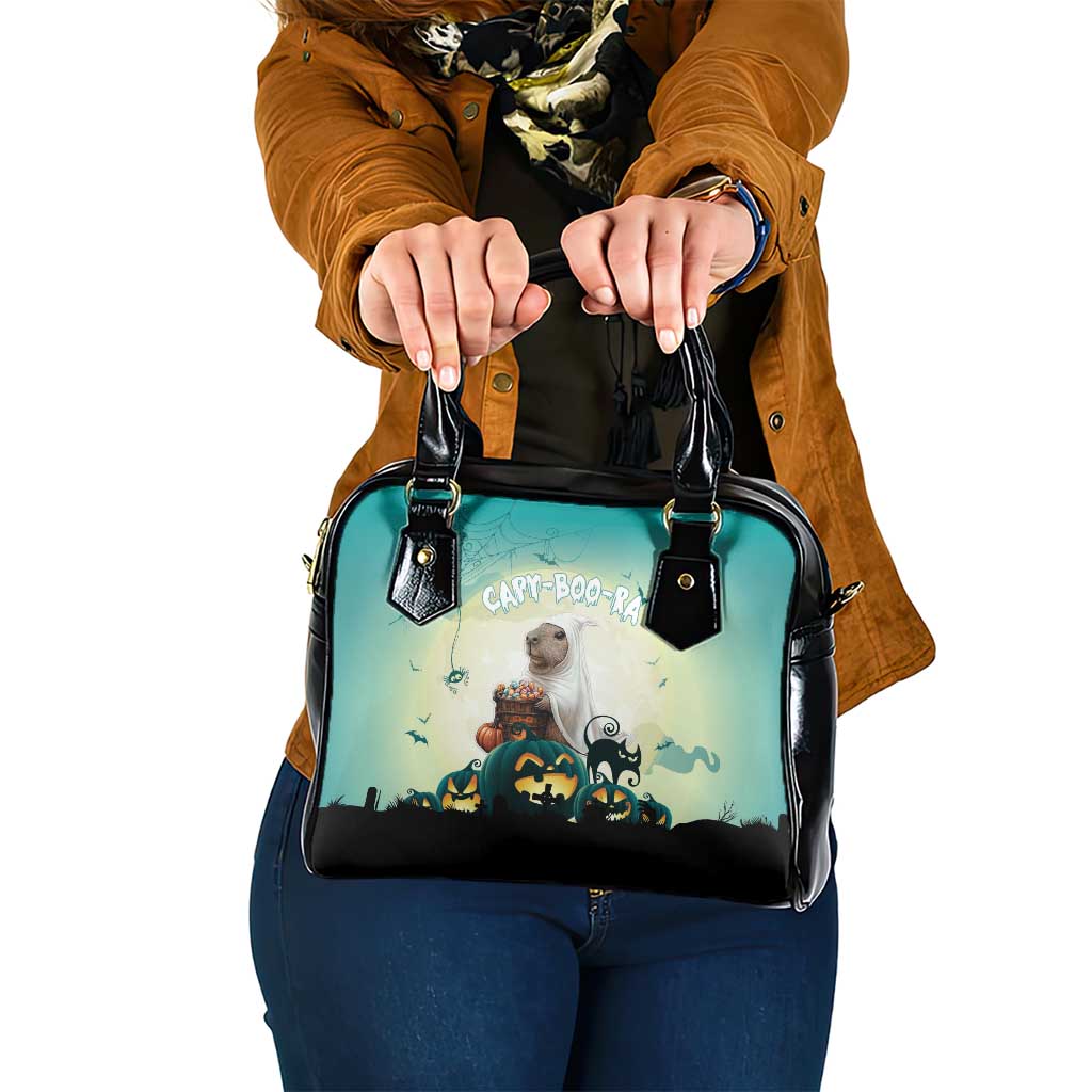 Spooky Halloween shoulder handbag with teal front and black trim, cat and pumpkins graphic