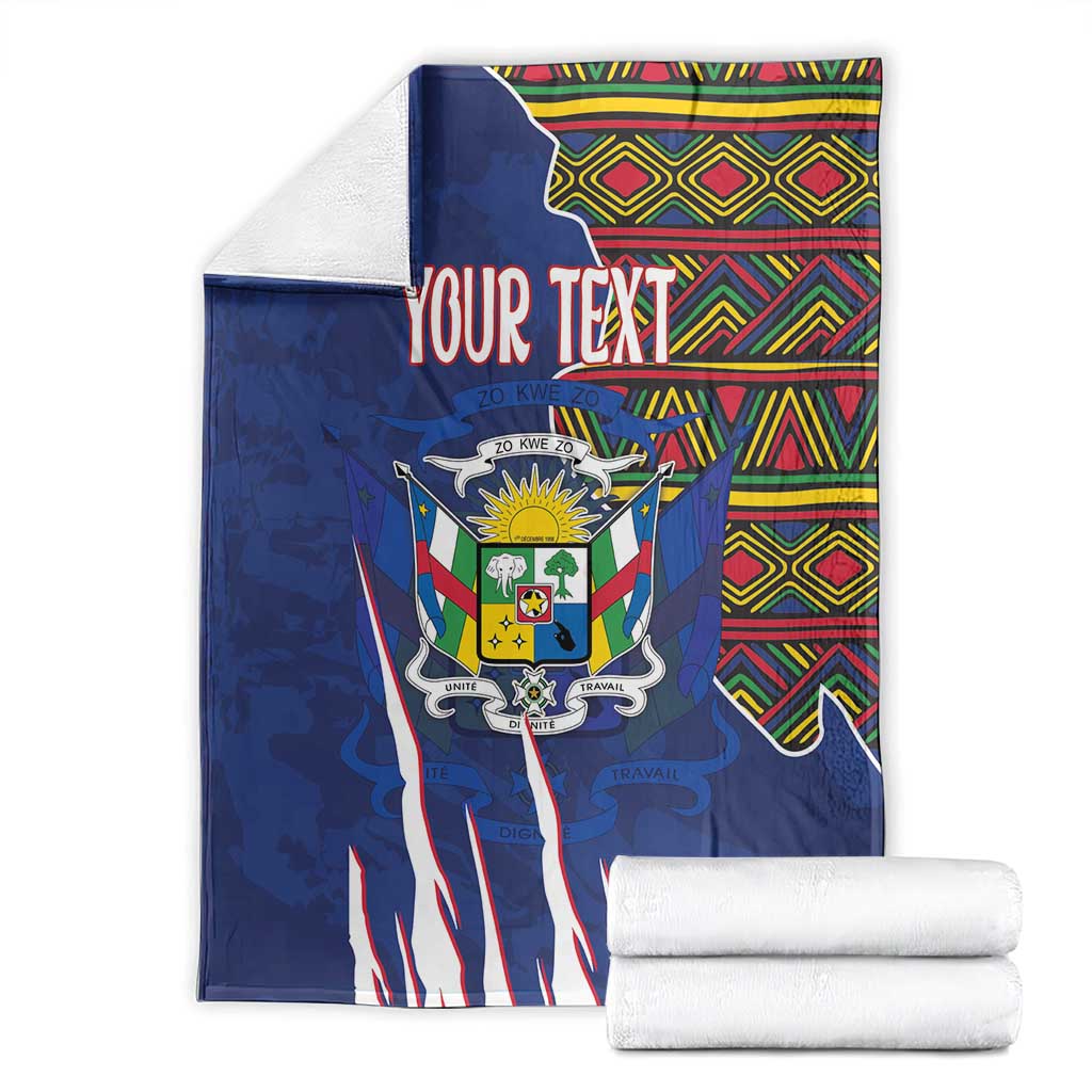 Personalized blue blanket folded with coat of arms emblem and kente pattern header