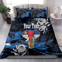 King bedding set on bed: blue-black elephant artwork with protea flowers on duvet and pillows