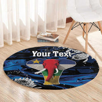 Round elephant graphic rug with blue swirls, red elephant, and yellow feet; custom text