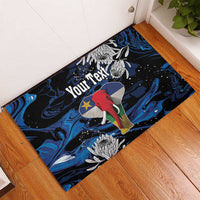 Personalized rubber doormat with 'Your Text' over red elephant on blue water swirls
