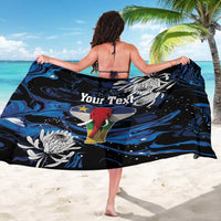 Black elephant-themed sarong draped on a woman’s back, with blue swirls and “Your Text”